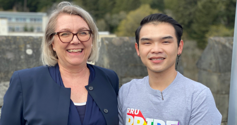 student Will Nguyễn and VP Academic & Provost Veronica Thompson pose for a picture atop Hatley Castle. 
